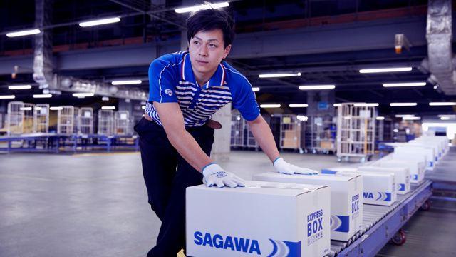 Sales Drivers loading cargoes into Sagawa's transfer center.